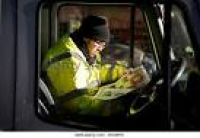 ... of his truck reading a UK ...