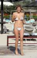 Ashley James highlights her toned curves in halterneck bikini as ...