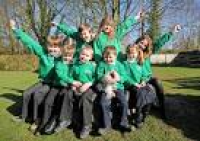 Colby School pupils receive a ...
