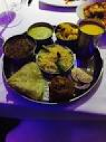 Wonderful selection of chutney and sauces with the poppadoms ...