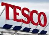 ... a sign for a Tesco store,