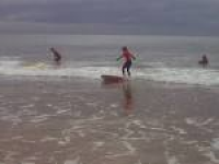Junior surfing academy lessons operated by SurfGSD at Caswell Bay ...