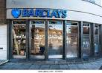 Outside a branch of Barclays ...