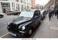 row of black london cabs taxis ...