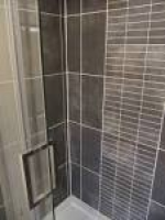 Completed tiled cubicle and