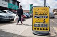 A sign reads 'Cars Wanted 4 ...