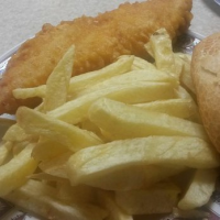 Cod, chips, and a buttered
