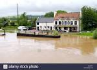 Haw Bridge Inn inches from being flooded on banks of River Severn ...