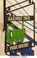 "Railway Inn" pub sign near