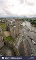Aerial view of Caernarfon Castle with River Arfon and Snowdonia ...