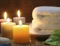 Towel, aromatic candles and other spa objects to make mood ...