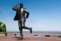 Eric Morecambe stands in