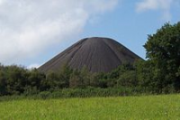 Large conical black mound with