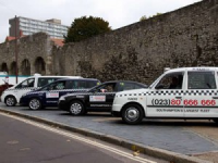 Radio Taxis cars outside city