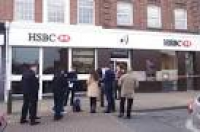 Police tape off HSBC bank in ...