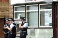 Police outside the HSBC branch ...